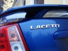 Chevrolet Lacetti: Он не настолько прост, чтобы пускать пыль в глаза - фотография 9